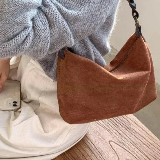 Een must-have - suede bruine tas